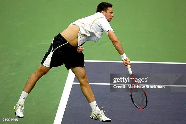 Robin Soderling of Sweden serves to Jo-Wilfried Tsonga of France during day five of the 2009 Shanghai ATP Masters 1000 at Qi Zhong Tennis Centre on...