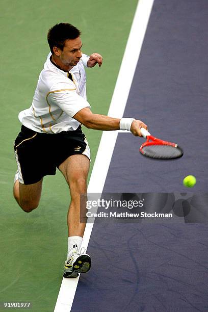 Robin Soderling of Sweden returns a shot to Jo-Wilfried Tsonga of France during day five of the 2009 Shanghai ATP Masters 1000 at Qi Zhong Tennis...
