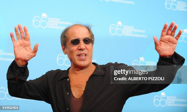 This file picture taken on September 4, 2008 at the Venice film festival shows Italy's singer and director Adriano Celentano posing during a...