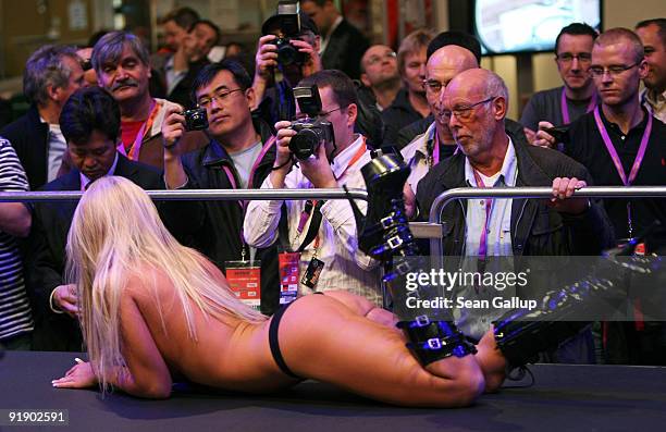Stripper performs at the Venus erotic trade fair during the press and industry professionals' day on October 15, 2009 in Berlin, Germany. Venus will...