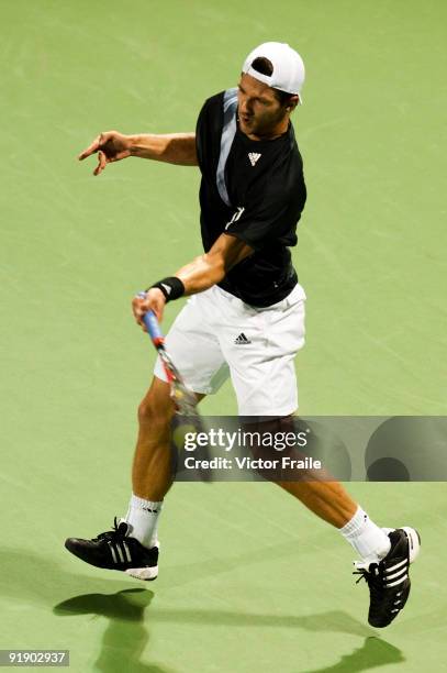 Jurgen Melzer of Austria returns a ball to Feliciano Lopez of Spain during day five of 2009 Shanghai ATP Masters 1000 at Qi Zhong Tennis Centre on...