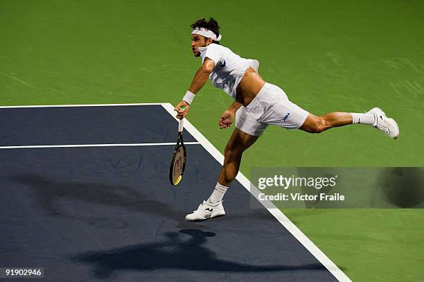 Feliciano Lopez of Spain serves to Jurgen Melzer of Austria during day five of 2009 Shanghai ATP Masters 1000 at Qi Zhong Tennis Centre on October...