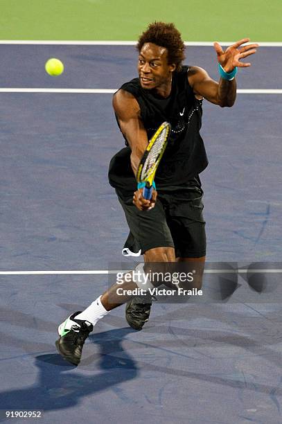 Gael Monfils of France returns a ball to Ivan Ljubicic of Croatia during day five of 2009 Shanghai ATP Masters 1000 at Qi Zhong Tennis Centre on...