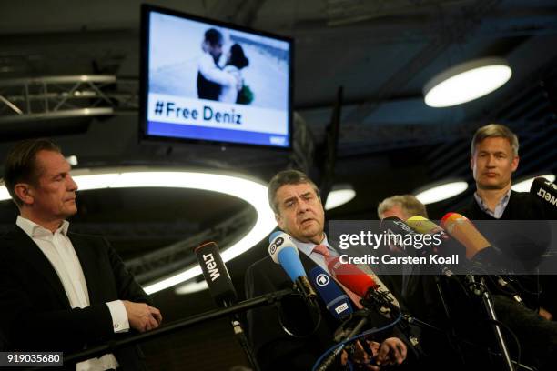 German Interim Foreign Minister Sigmar Gabriel , Axel Springer Verlag Chairman Matthias Doepfner and Die Welt Editor-In-Chief Ulf Poschardt speak to...