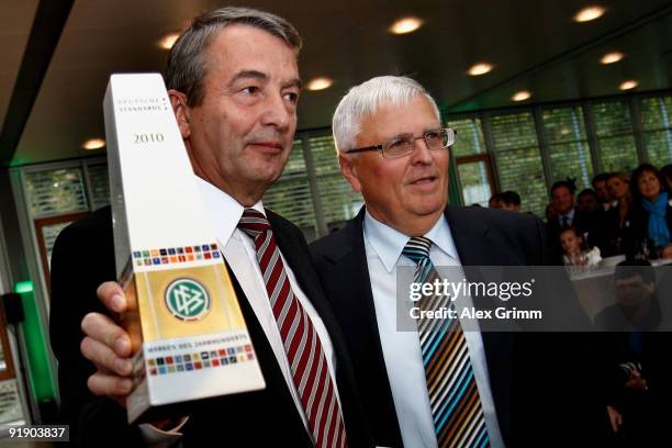 Theo Zwanziger , president of the German Football Association DFB, and DFB General Secretary Wolfgang Niersbach pose during the presentation of the...