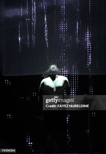 An African artist performs during the official closing ceremony of the 2nd Pan-African Cultural Festival , on July 20, 2009. In Algiers. Algeria...