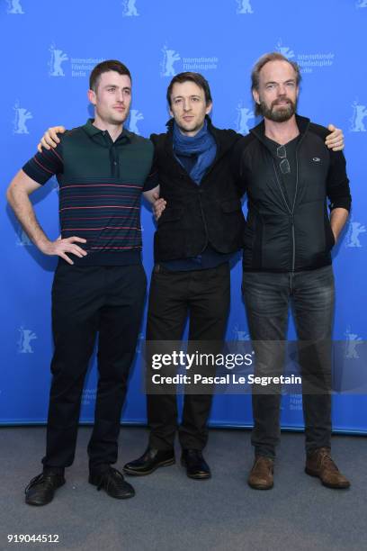 James Frecheville, Lance Daly and Hugo Weaving pose at the 'Black 47' photo call during the 68th Berlinale International Film Festival Berlin at...