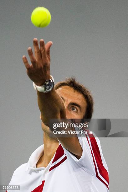 Tommy Robredo of Spain serves to his compatriot Rafael Nadal during day five of 2009 Shanghai ATP Masters 1000 at Qi Zhong Tennis Centre on October...