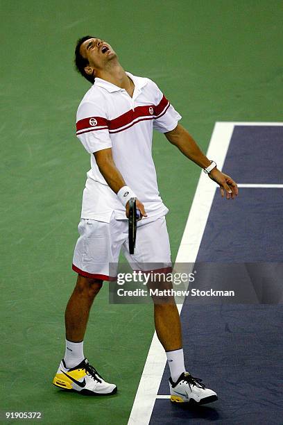 Tommy Robredo of Spain reacts to a lost point to Rafael Nadal of Spain during day five of the 2009 Shanghai ATP Masters 1000 at Qi Zhong Tennis...