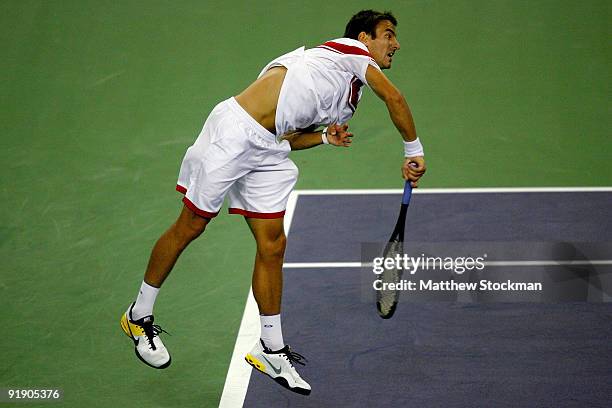 Tommy Robredo of Spain serves to Rafael Nadal of Spain during day five of the 2009 Shanghai ATP Masters 1000 at Qi Zhong Tennis Centre on October 15,...