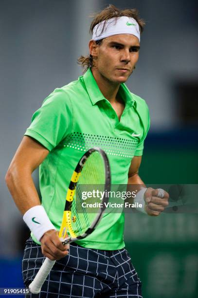 Rafael Nadal of Spain celebrates a point against his compatriot Tommy Robredo during day five of 2009 Shanghai ATP Masters 1000 at Qi Zhong Tennis...