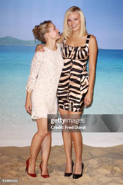 Kristen Bell and Malin Akerman attends photocall to promote 'Couples Retreat' on October 15, 2009 in London, England.