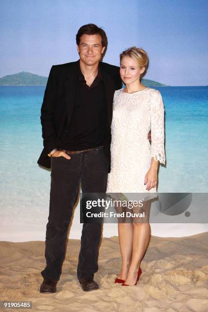 Jason Bateman and Kristen Bell attends photocall to promote 'Couples Retreat' on October 15, 2009 in London, England.