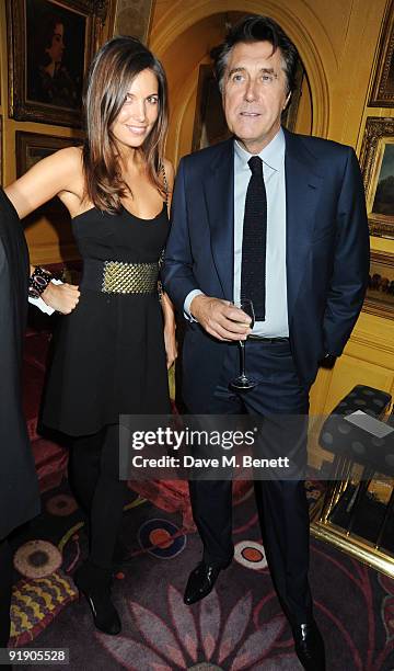 Amanda Sheppard and Bryan Ferry attend the Brioni fragrance launch dinner hosted by Andrea Perrone and Bryan Ferry, at Annabel's Restaurant on...