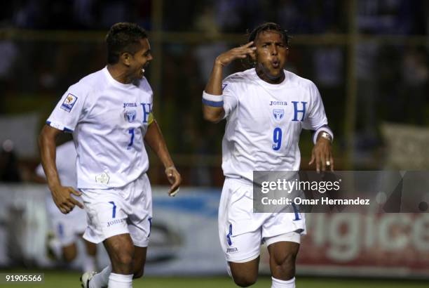 Carlos Pavon of Honduras and Amado Guevara celebrate their victory against El Salvador as part of the 2010 FIFA World Cup Qualifier at Cuscatlan...