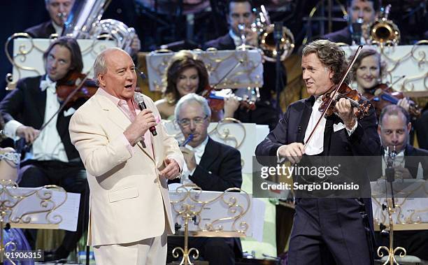 Radio personality Alan Jones performs alongside musician Andre Rieu during a live perform at Acer Arena on October 15, 2009 in Sydney, Australia.