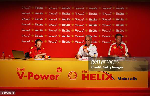 Emilio Gouvea and Gilberto Pose talk at a Shell press conference during previews to the Brazilian Formula One Grand Prix on October 15, 2009 in Sao...