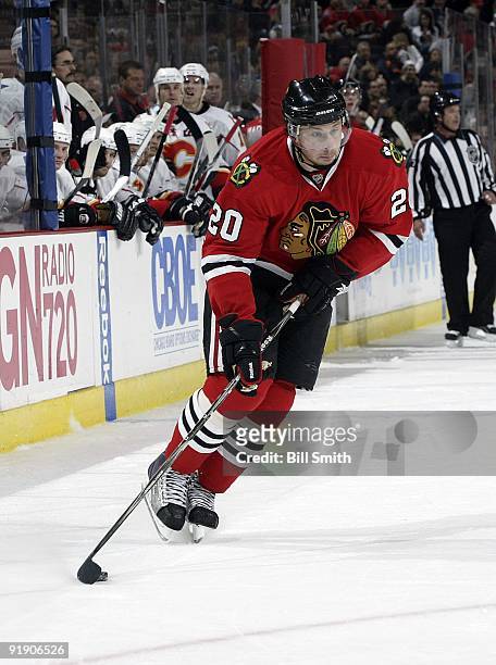 Jack Skille of the Chicago Blackhawks takes the puck towards the goal during a game against the Calgary Flames on October 12, 2009 at the United...