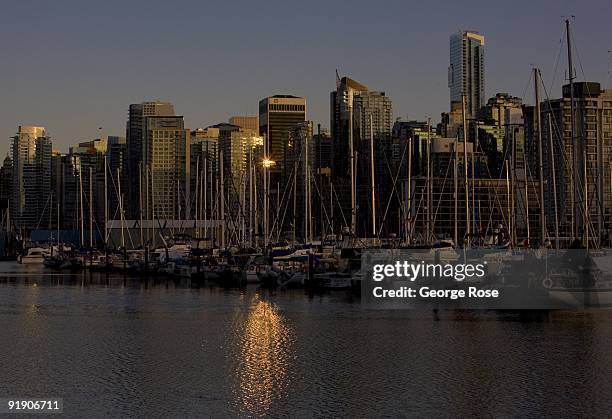 The new highrise condominiums, boats, offices and hotels along the Coal Harbour waterfront are seen in this 2009 Vancouver, British Columbia, Canada,...