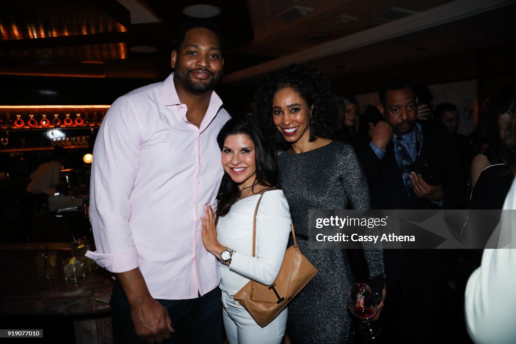 Former NBA player Robert Horry and wife Keva Develle pose with sports