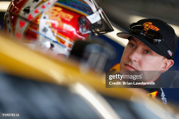 Daniel Hemric, driver of the South Point Hotel & Casino Chevrolet, gets into his car during practice for the NASCAR Xfinity Series PowerShares QQQ...