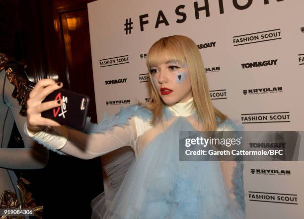 Model Ellie Rae Winstone backstage ahead of the Pam Hogg show during London Fashion Week February 2018 at The Freemason's Hall on February 16, 2018...