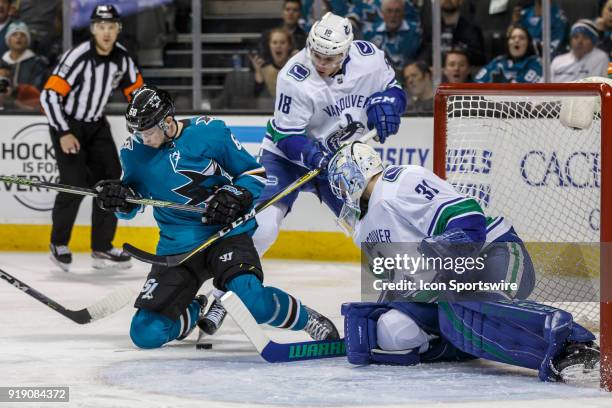 Vancouver Canucks goaltender Anders Nilsson makes a save during the first period of the regular season game between the San Jose Sharks and the...