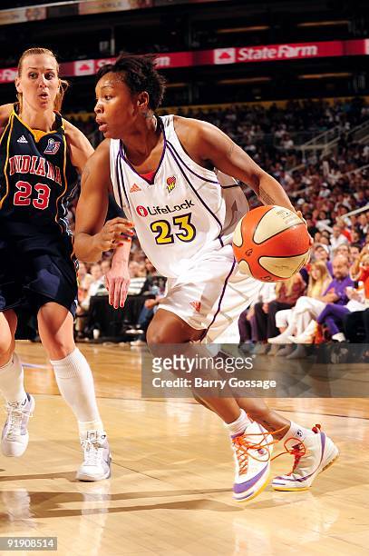 Cappie Pondexter of the Phoenix Mercury makes a move to the basket against Katie Douglas of the Indiana Fever in Game Five of the WNBA Finals at U.S....