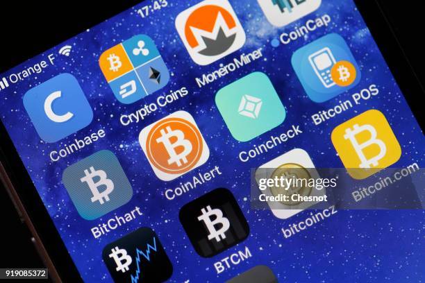 In this photo illustration, the icon of the the Coincheck cryptocurrency exchange application is seen on the screen of an iPhone on February 16, 2018...