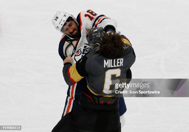 Edmonton Oilers left wing Jujhar Khaira punches Vegas Golden Knights defenseman Colin Miller during the third period of a regular season NHL game...
