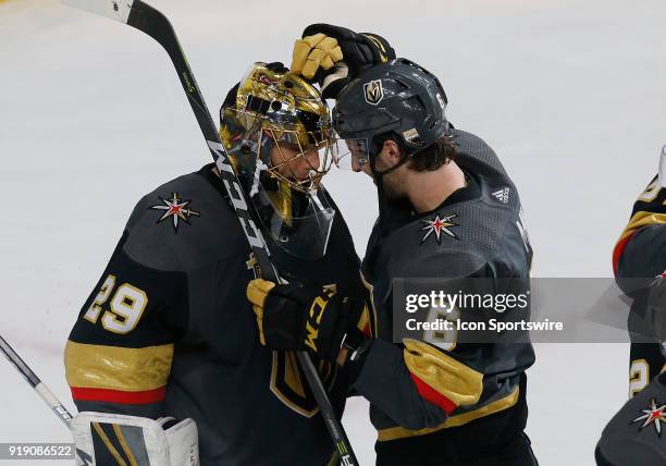 Vegas Golden Knights goaltender Marc-Andre Fleury and Vegas Golden Knights defenseman Colin Miller bump their helmets after defeating the Edmonton...