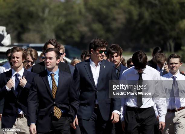 Young men arrive to attend a funeral service for 16 year-old student Meadow Pollack, at the Jewish congregation Kol Tikvah, on February 16, 2018 in...