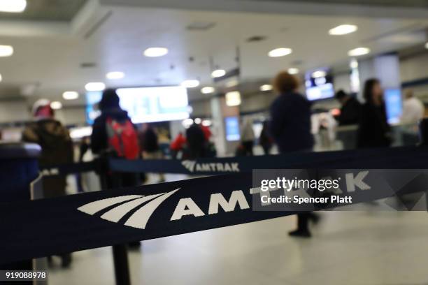 People walk through New York's Pennsylvania Station on February 16, 2018 in New York City. Amtrak gave a media tour on Friday to show the progress...