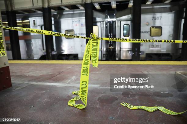 Yellow caution tape blocks off an area under construction at New York's Pennsylvania Station on February 16, 2018 in New York City. Amtrak gave a...