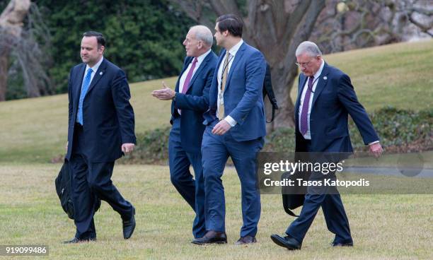 White House Chief of Staff John Kelly walks from the Oval Office to the Marine One helicopter as they depart from the South Lawn of the White House...