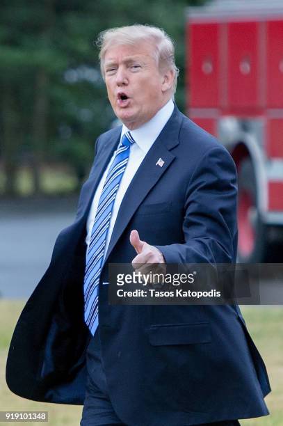 President Donald Trump walks from the Oval Office to the Marine One helicopter as they depart from the South Lawn of the White House on February 16,...