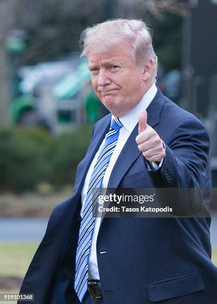 President Donald Trump walks from the Oval Office to the Marine One helicopter as they depart from the South Lawn of the White House on February 16,...