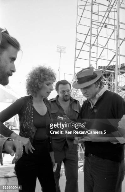 Actress Barbra Streisand and Bill Graham are photographed on the set of 'A Star is Born' in 1976 at Sun Devil Stadium in Tempe, Arizona. CREDIT MUST...