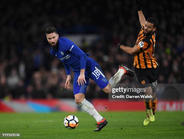Olivier Giroud of Chelsea gets to the ball ahead of Kevin Stewart of Hull City during the Emirates FA Cup Fifth Round match between Chelsea and Hull...