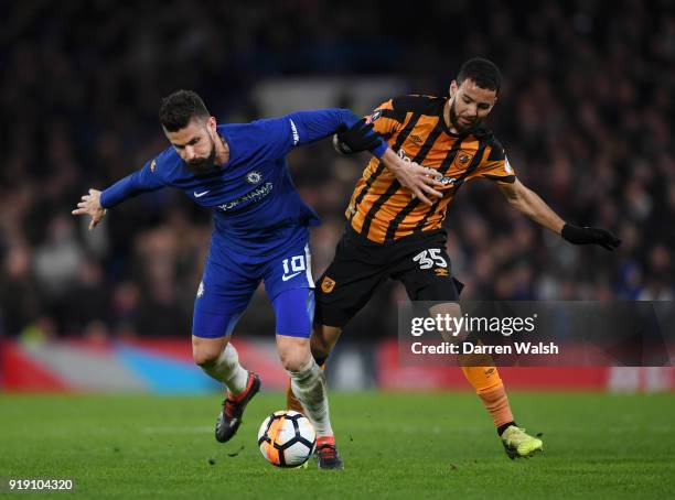 Olivier Giroud of Chelsea gets to the ball ahead of Kevin Stewart of Hull City during the Emirates FA Cup Fifth Round match between Chelsea and Hull...