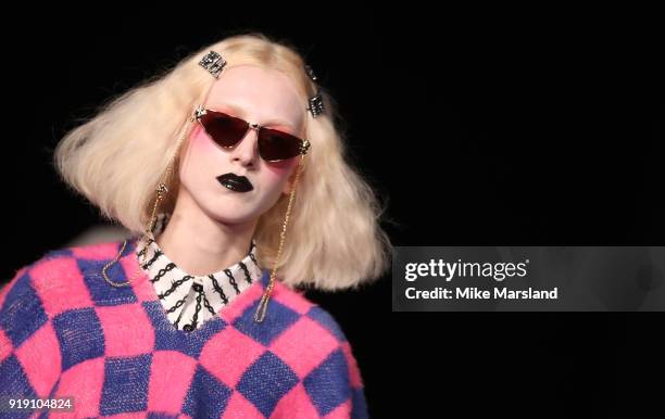 Model walks the runway at the Ashley Williams show during London Fashion Week February 2018 at University of Westminster on February 16, 2018 in...