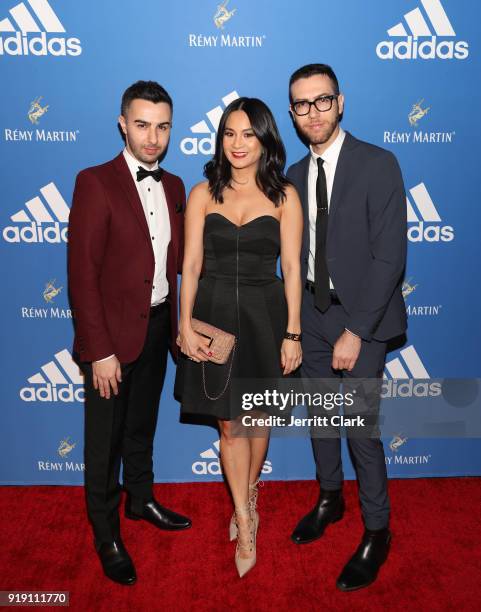 Thuy-Anh J. Nguyen poses with Rap-Up Founders Cameron Lazerine and Devin Lazerine attend the Adidas Basketball Black Tie Party Presented by Remy...