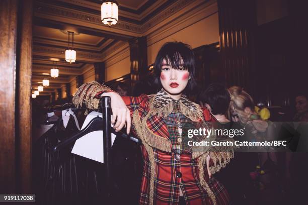 Model backstage ahead of the Pam Hogg show during London Fashion Week February 2018 at The Freemason's Hall on February 16, 2018 in London, England.