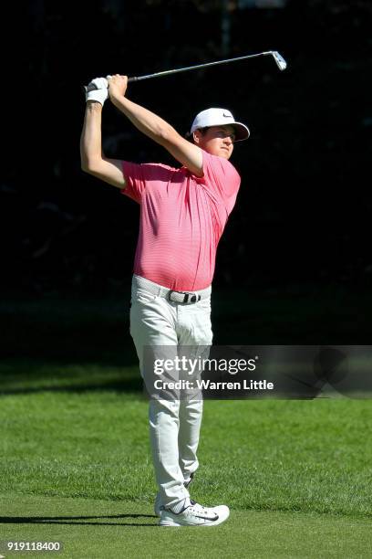 Cody Gribble plays his shot on the 12th hole during the second round of the Genesis Open at Riviera Country Club on February 16, 2018 in Pacific...