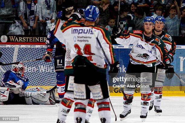 Chris Collins of Augsburg celebrates his team's second goal during the DEL match between Adler Mannheim and Augsburger Panther at the SAP Arena on...