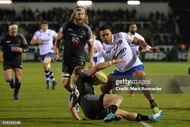 Cooper Vuna of Bath Rugby is tackled by Alex Tait of Newcastle Falcons during the Aviva Premiership match between Newcastle Falcons and Bath Rugby at...