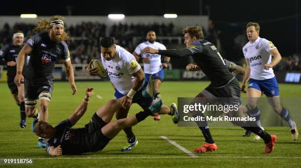 Cooper Vuna of Bath Rugby is tackled by Alex Tait of Newcastle Falcons during the Aviva Premiership match between Newcastle Falcons and Bath Rugby at...