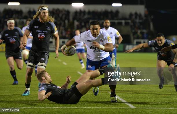 Cooper Vuna of Bath Rugby is tackled by Alex Tait of Newcastle Falcons during the Aviva Premiership match between Newcastle Falcons and Bath Rugby at...