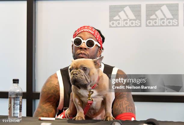 Chainz and his dog Trappy speak during a press conference at adidas Creates 747 Warehouse St., an event in basketball culture, on February 16, 2018...