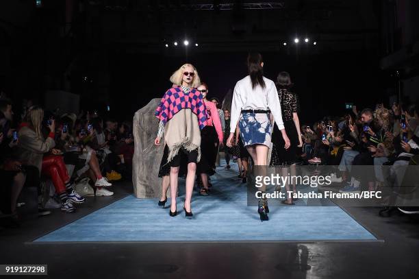 Model walks the runway at the Ashley Williams show during London Fashion Week February 2018 at University of Westminster on February 16, 2018 in...